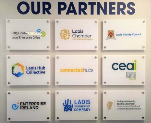Wall saying Our Partners with Plaques for Laois Enterprise Office, Laois Chamber, Laois County Council. Laois Hub Collective, Connected Hubs, Community Enterprise Association Ireland, Enterprise Ireland, Laois Partnership Company, Department of Rural and Community Development